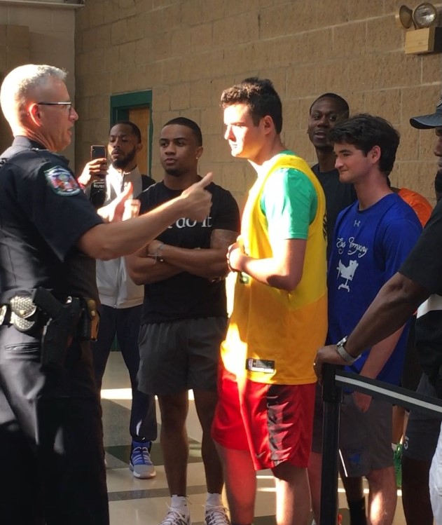 Officer speaking with teenagers