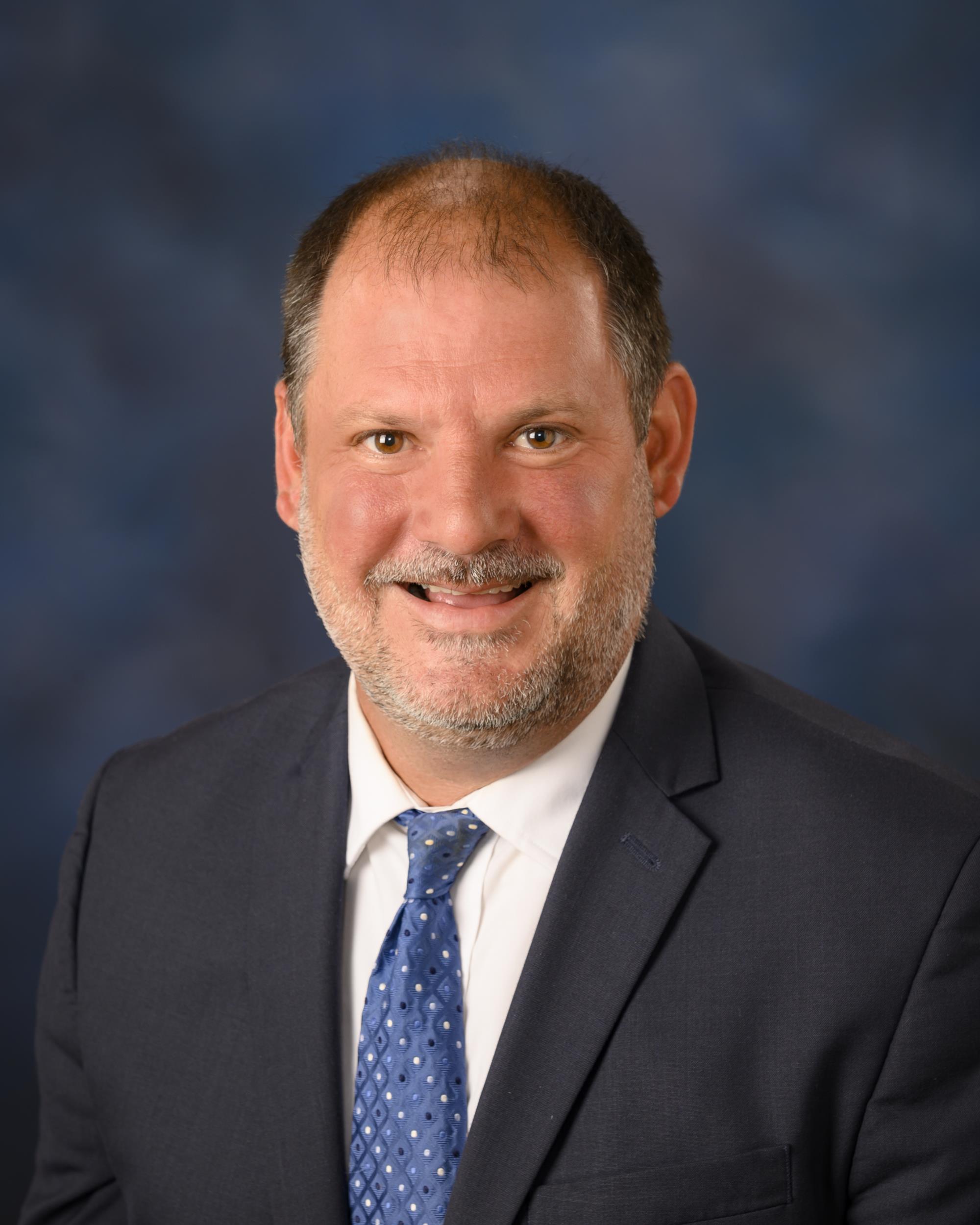 headshot of councilman David Buck